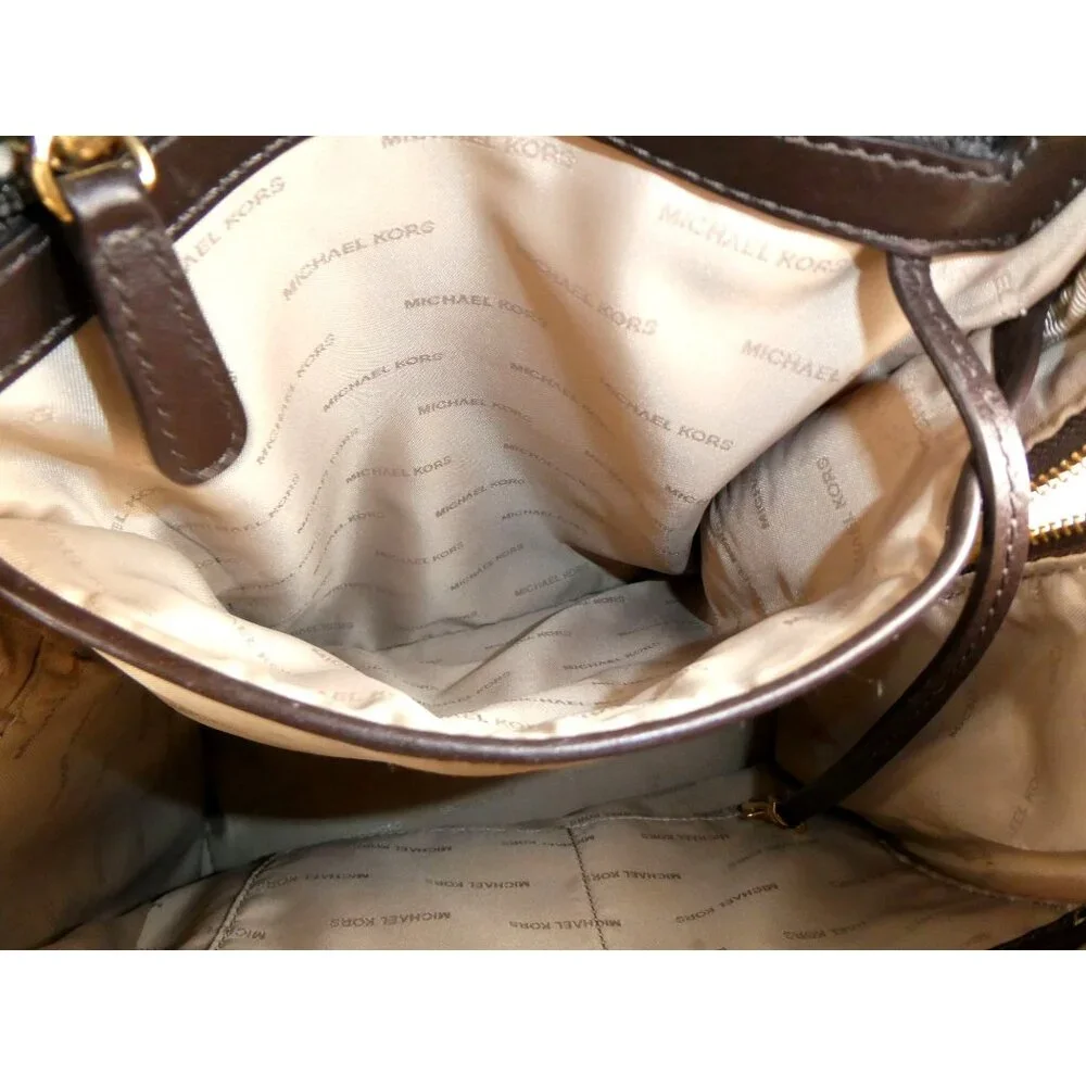 Michael Kors Brown Monogrammed Leather Shearling Trim Mini Backpack